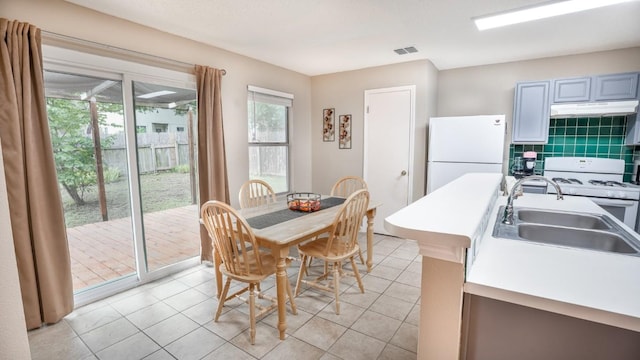 8086 Thaxton Rd, Austin, TX 78747 - dining area featuring light tile patterned floors