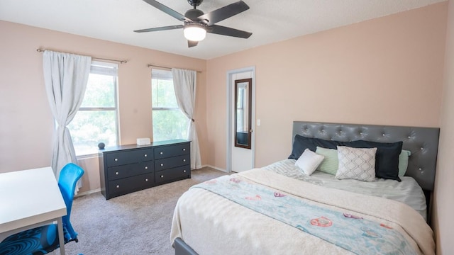 8086 Thaxton Rd, Austin, TX 78747 - carpeted bedroom with a ceiling fan