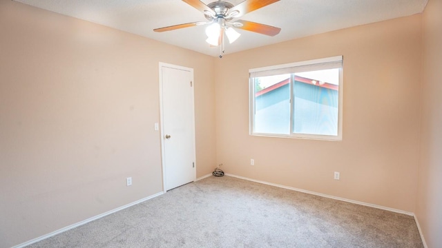8086 Thaxton Rd, Austin, TX 78747 - carpeted empty room featuring a ceiling fan and baseboards