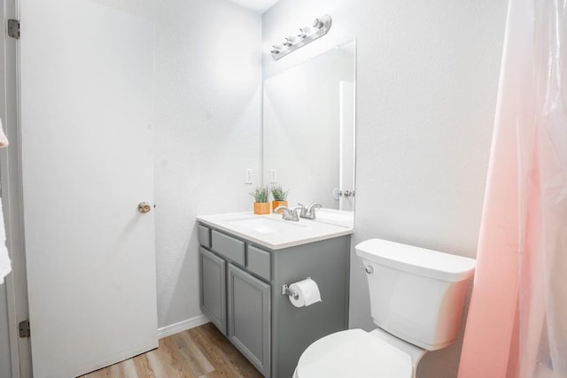 8086 Thaxton Rd, Austin, TX 78747 - half bath with vanity and wood finished floors