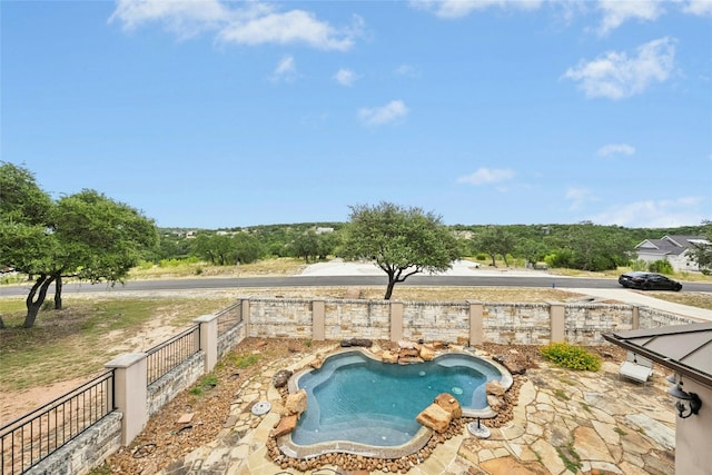 1073 Las Brisas Dr, Canyon Lake, TX 78133 - view of swimming pool with a fenced backyard and a patio