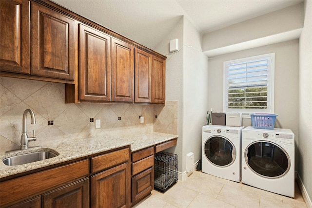 1073 Las Brisas Dr, Canyon Lake, TX 78133 - laundry room with washing machine and dryer and cabinet space