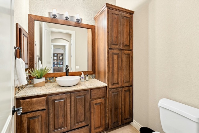 1073 Las Brisas Dr, Canyon Lake, TX 78133 - bathroom featuring vanity and a textured wall