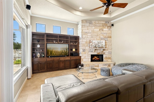 1073 Las Brisas Dr, Canyon Lake, TX 78133 - living room with a tray ceiling, healthy amount of natural light, ornamental molding, and ceiling fan