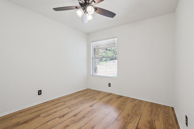 1613 J J Seabrook Dr, Austin, TX 78721 - unfurnished room featuring light wood-style flooring and a ceiling fan