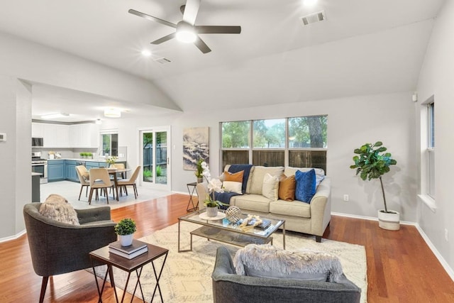 2716 Cradlerock Ter, Austin, TX 78748 - living room with vaulted ceiling, a ceiling fan, and light wood-type flooring