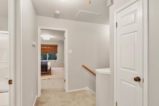 2716 Cradlerock Ter, Austin, TX 78748 - hallway with an upstairs landing and light colored carpet