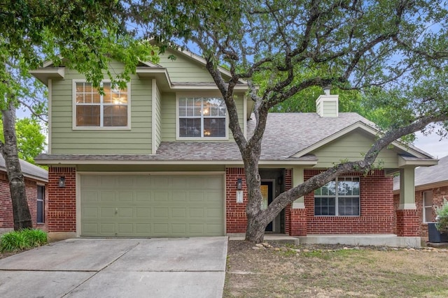 2716 Cradlerock Ter, Austin, TX 78748 - view of front of house featuring driveway, brick siding, an attached garage, and a chimney