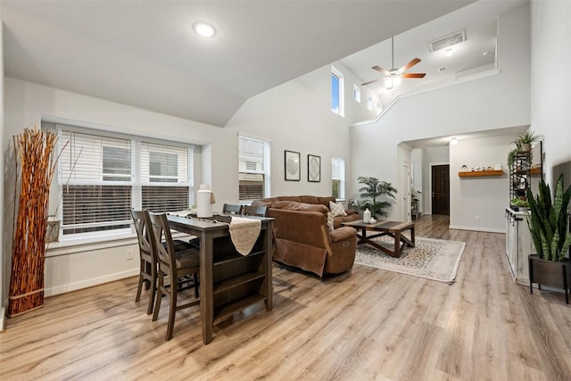 209 Lambert St, Leander, TX 78641 - dining area featuring a ceiling fan, wood finished floors, and lofted ceiling
