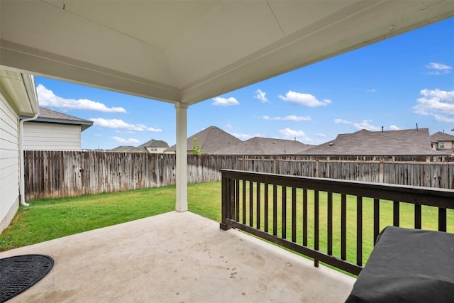 209 Lambert St, Leander, TX 78641 - fenced backyard featuring a patio area and a residential view