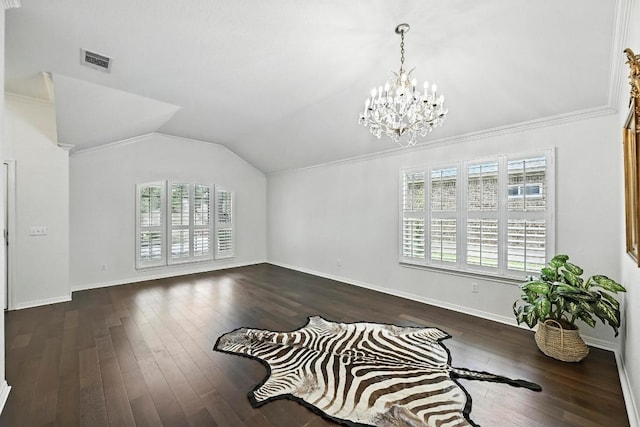 6428 Clay Allison Pass, Austin, TX 78749 - unfurnished dining area featuring a chandelier, dark wood-type flooring, vaulted ceiling, and crown molding