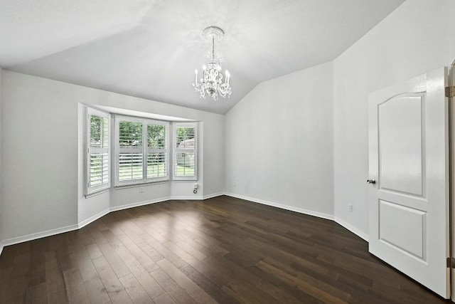 6428 Clay Allison Pass, Austin, TX 78749 - spare room with a chandelier, vaulted ceiling, and dark wood-type flooring