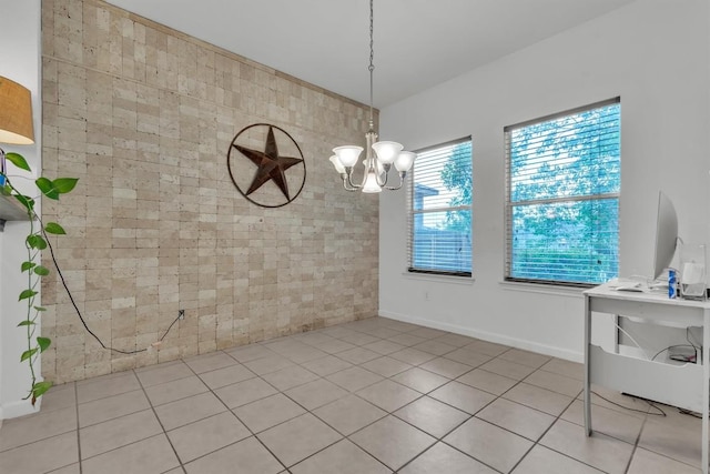 2101 Charlotte Estates Dr, Austin, TX 78744 - unfurnished dining area with tile patterned floors and a chandelier
