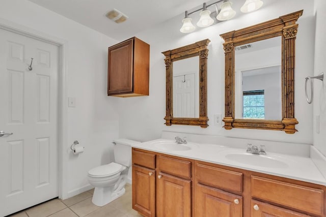 2101 Charlotte Estates Dr, Austin, TX 78744 - full bath with double vanity and tile patterned floors