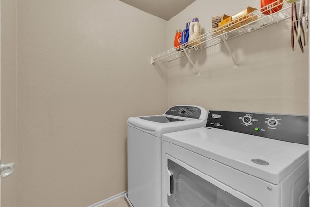 2101 Charlotte Estates Dr, Austin, TX 78744 - washroom with independent washer and dryer and baseboards
