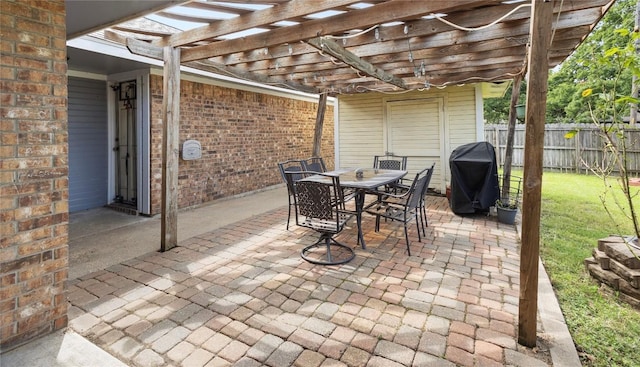 5804 Sheffield Terrace Ln, Bryan, TX 77802 - view of patio featuring a grill, a pergola, and outdoor dining space