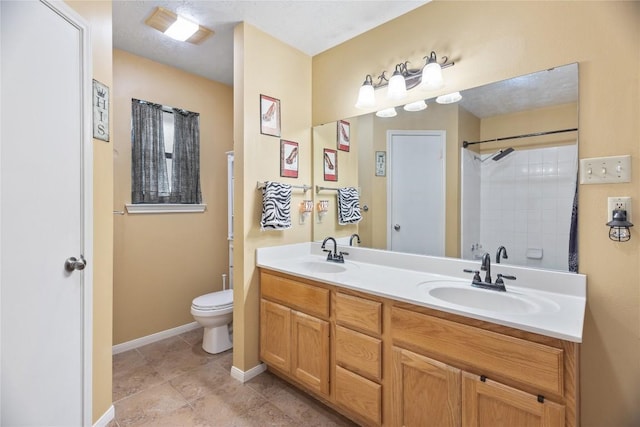 5804 Sheffield Terrace Ln, Bryan, TX 77802 - full bath with double vanity, a shower, and tile patterned flooring