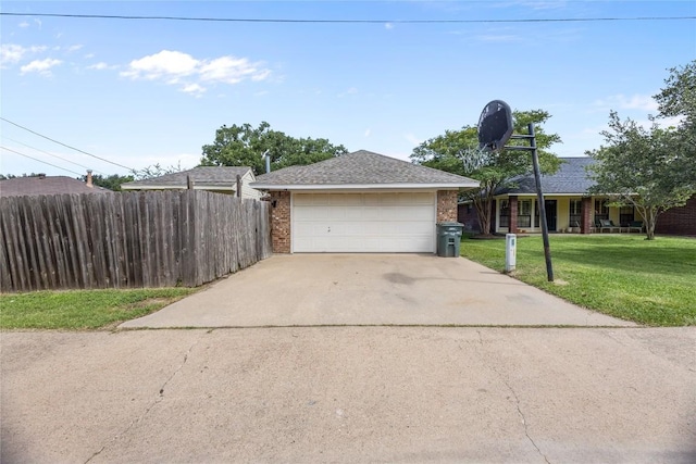 5804 Sheffield Terrace Ln, Bryan, TX 77802 - view of front facade with brick siding, roof with shingles, and a garage