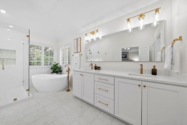 10839 Redmond Rd, Austin, TX 78739 - full bath with double vanity, a shower stall, a freestanding bath, and marble look tiles