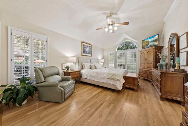 10839 Redmond Rd, Austin, TX 78739 - bedroom featuring light wood-style floors, multiple windows, lofted ceiling, and a ceiling fan