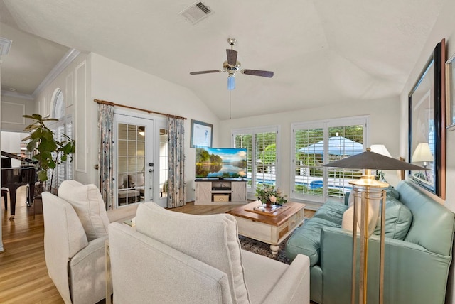 10839 Redmond Rd, Austin, TX 78739 - living area featuring light wood-style flooring, a ceiling fan, vaulted ceiling, and french doors