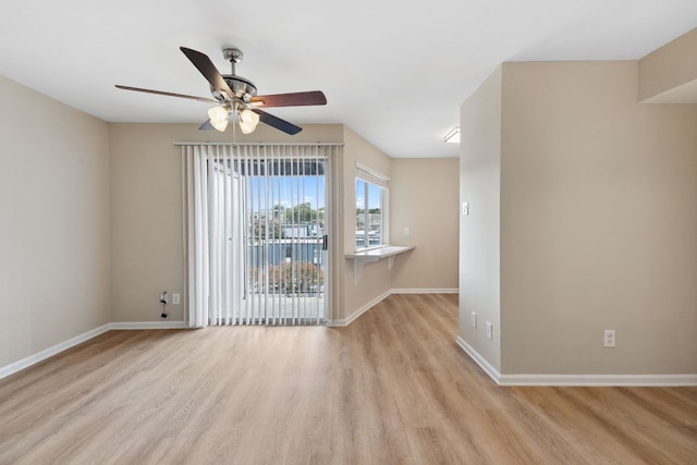 1840 Burton Dr Unit 155, Austin, TX 78741 - empty room featuring a ceiling fan and wood finished floors