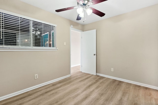 1840 Burton Dr Unit 155, Austin, TX 78741 - empty room with wood finished floors and a ceiling fan
