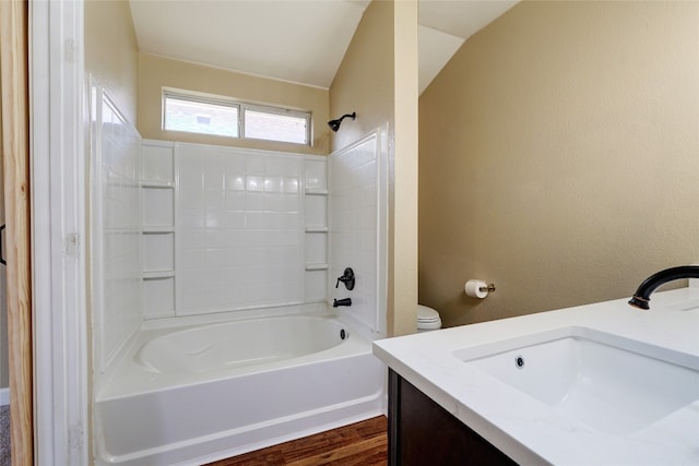 136 Holmstrom St, Hutto, TX 78634 - bathroom with vanity, shower / bathtub combination, and wood finished floors
