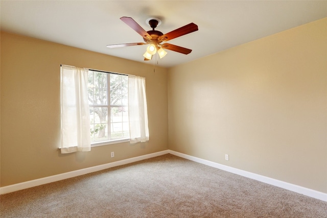 136 Holmstrom St, Hutto, TX 78634 - carpeted spare room with baseboards and ceiling fan