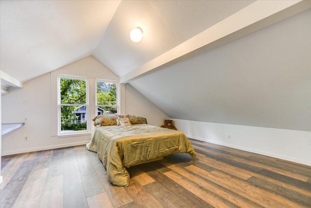 4415 Ave D Ave, Austin, TX 78751 - bedroom with vaulted ceiling and wood finished floors