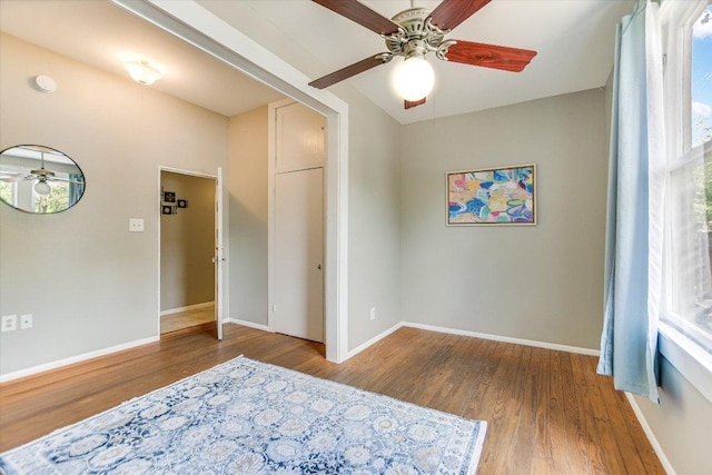 4415 Ave D Ave, Austin, TX 78751 - unfurnished bedroom with wood finished floors and a ceiling fan