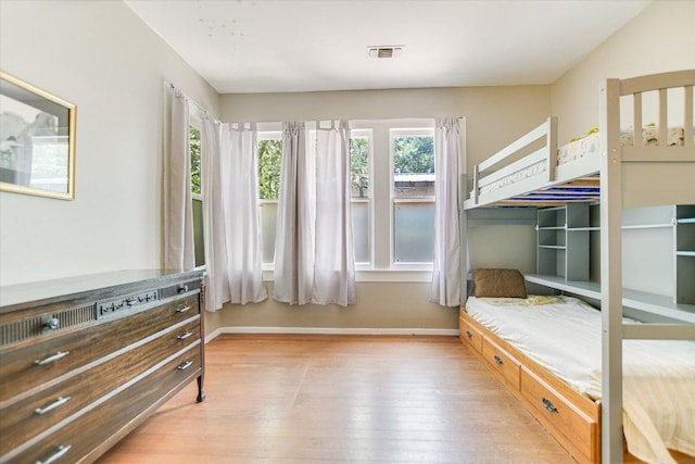 4415 Ave D Ave, Austin, TX 78751 - bedroom with light wood-style floors and baseboards