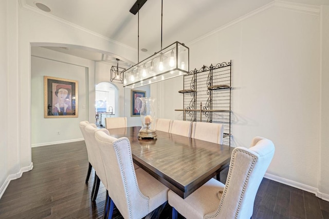 518 Victoria Dr, Cedar Park, TX 78613 - dining area featuring arched walkways, dark wood-style flooring, ornamental molding, and lofted ceiling
