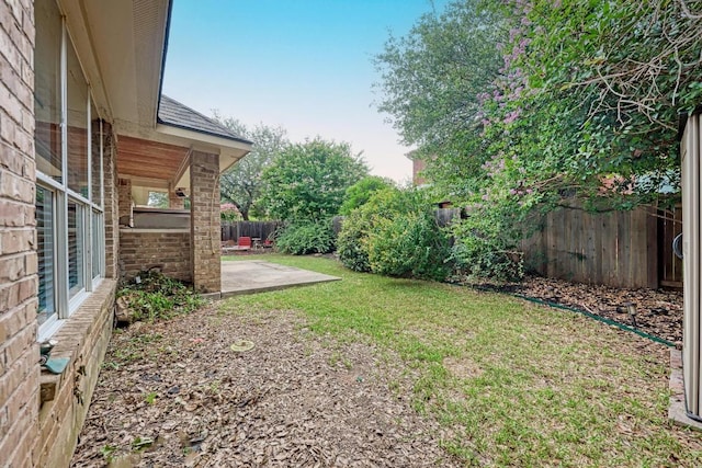 518 Victoria Dr, Cedar Park, TX 78613 - fenced backyard featuring a patio area