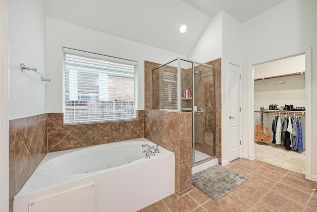 518 Victoria Dr, Cedar Park, TX 78613 - bathroom with a jetted tub, a shower stall, a spacious closet, tile patterned floors, and recessed lighting