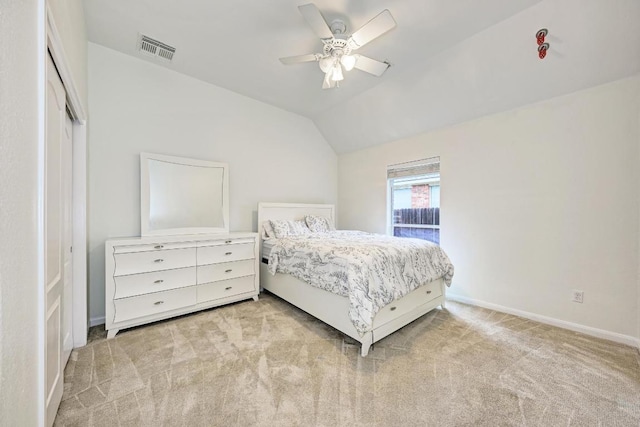 518 Victoria Dr, Cedar Park, TX 78613 - bedroom with light colored carpet, vaulted ceiling, ceiling fan, and a closet