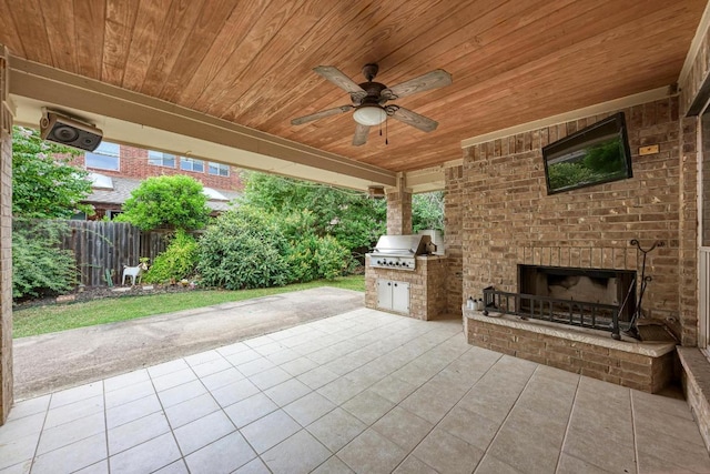 518 Victoria Dr, Cedar Park, TX 78613 - view of patio with an outdoor brick fireplace, area for grilling, and a ceiling fan
