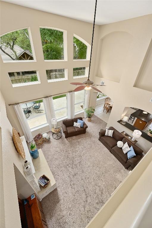 4004 Callabero Cv, Round Rock, TX 78681 - living area featuring a high ceiling and ceiling fan