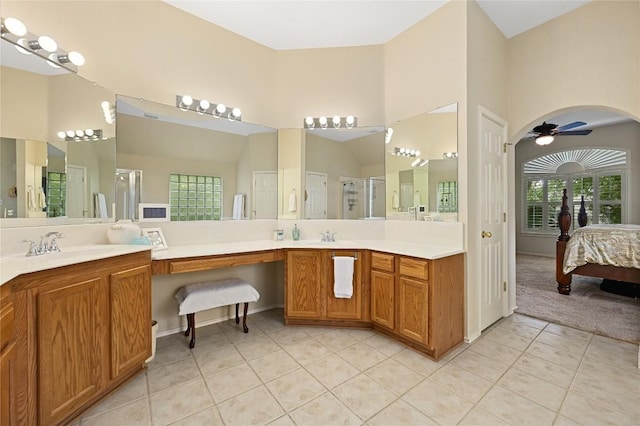 4004 Callabero Cv, Round Rock, TX 78681 - ensuite bathroom featuring ceiling fan, a stall shower, tile patterned flooring, and vanity