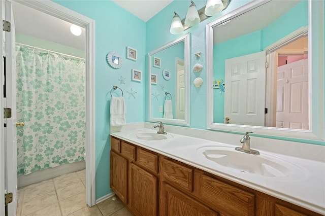 4004 Callabero Cv, Round Rock, TX 78681 - full bath featuring double vanity, tile patterned floors, and a shower with shower curtain
