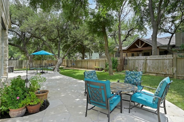 4004 Callabero Cv, Round Rock, TX 78681 - fenced backyard featuring outdoor dining area and a patio area
