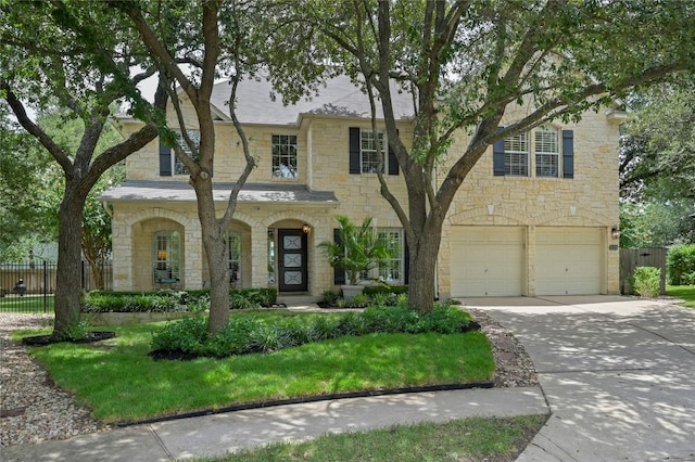 4004 Callabero Cv, Round Rock, TX 78681 - view of front facade with stone siding, concrete driveway, and an attached garage