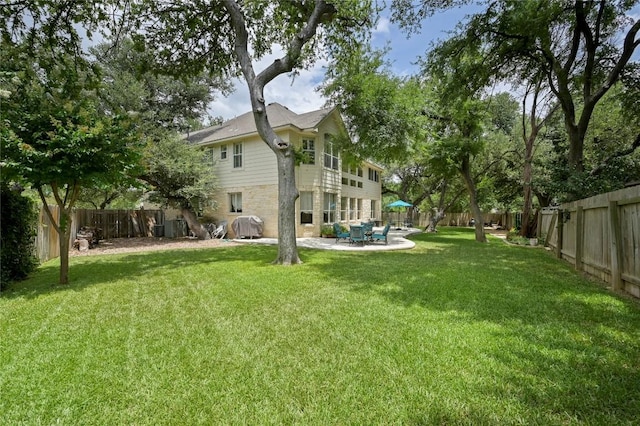 4004 Callabero Cv, Round Rock, TX 78681 - fenced backyard with a patio area