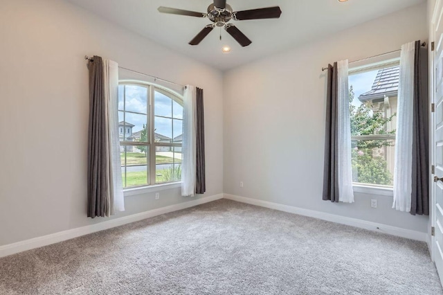 321 Cimarron Hills Trl E, Georgetown, TX 78628 - carpeted empty room with plenty of natural light, ceiling fan, and recessed lighting