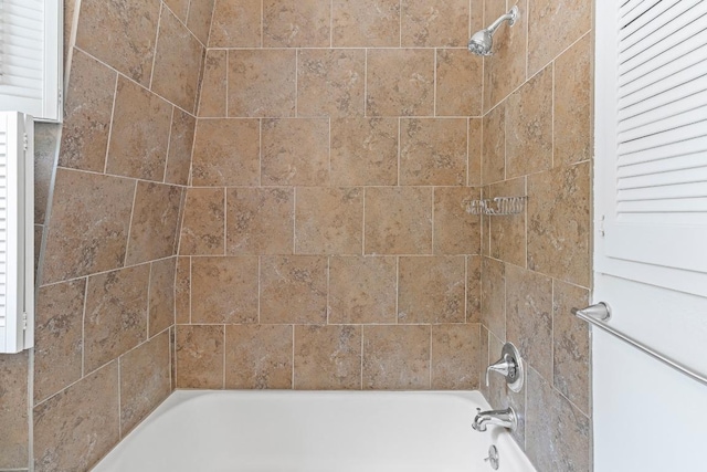 2704 San Pedro St Unit A16, Austin, TX 78705 - bathroom featuring washtub / shower combination and radiator