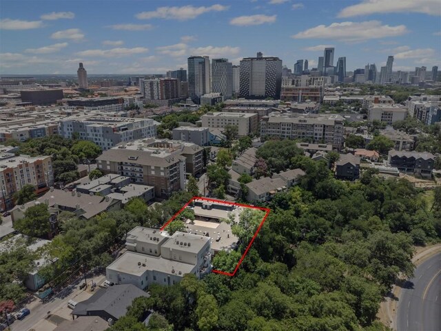 2704 San Pedro St Unit A16, Austin, TX 78705 - aerial view of property and surrounding area with skyline and property parcel outlined