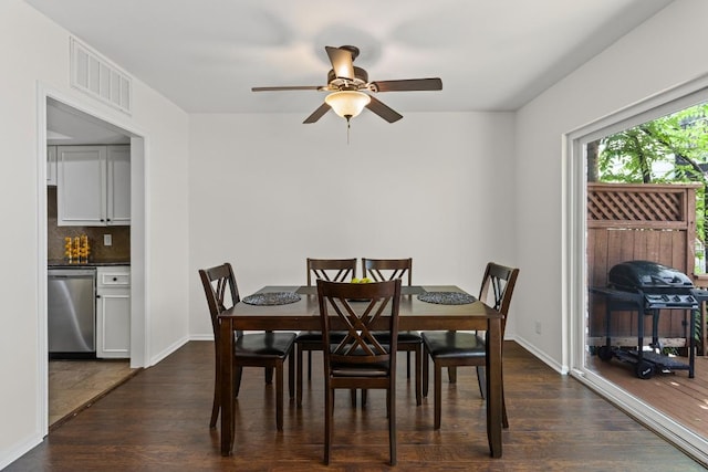 2704 San Pedro St Unit A16, Austin, TX 78705 - dining space with dark wood-style flooring and a ceiling fan