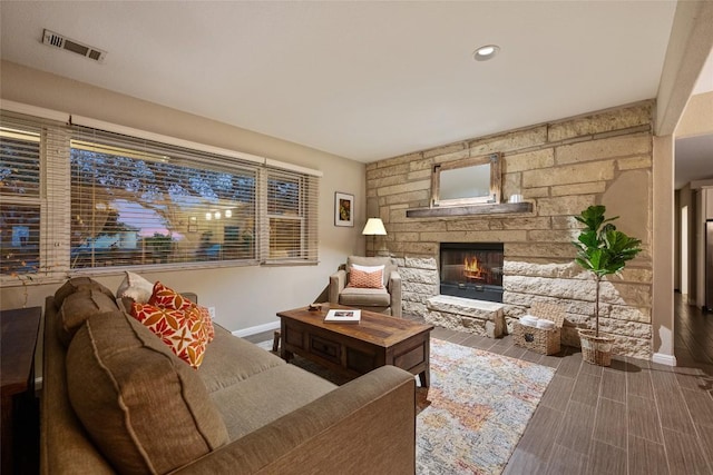 4500 Poteau Cir, Austin, TX 78734 - living area featuring a fireplace, recessed lighting, and wood finish floors