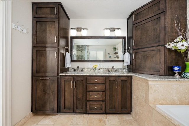 4500 Poteau Cir, Austin, TX 78734 - full bathroom featuring double vanity and a garden tub