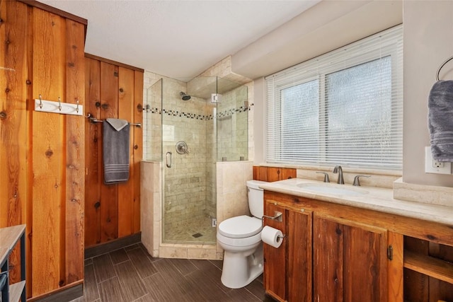 4500 Poteau Cir, Austin, TX 78734 - full bath with vanity, a shower stall, and wood finished floors